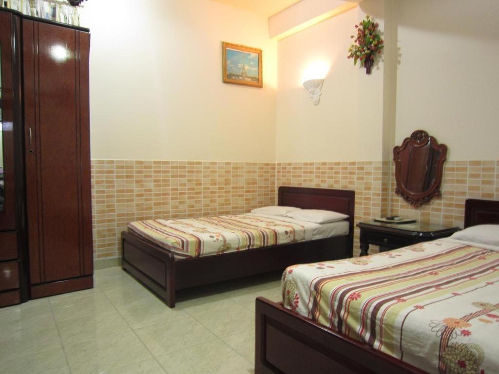 Timi Hotel Хошимин Екстериор снимка