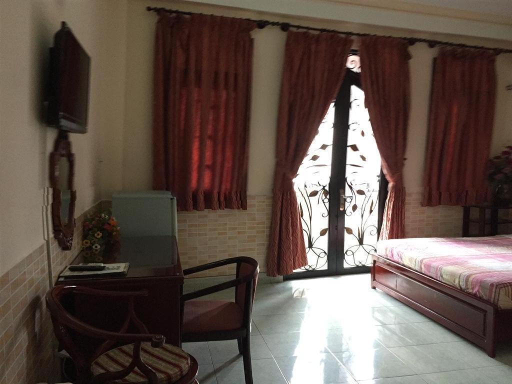 Timi Hotel Хошимин Екстериор снимка
